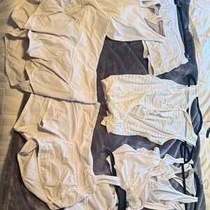 Lululemon size 4 seven pieces not so white two shorts one skirt 4 tops size 4
